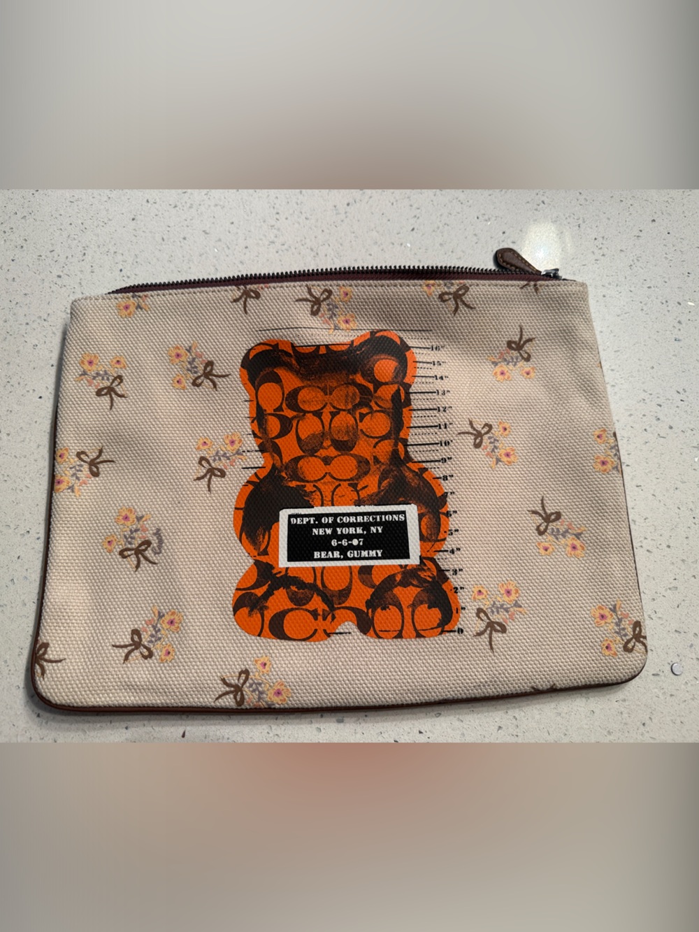 Coach Beige Floral Cosmetic Pouch with Orange Graphic